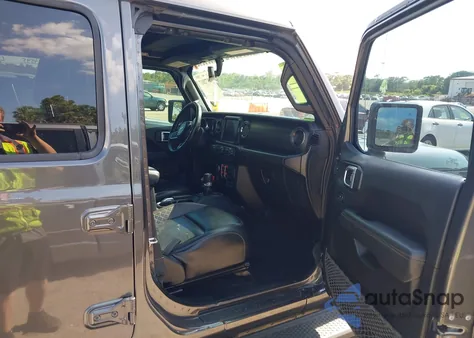 2020 Jeep Wrangler Unlimited Sahara from USA, damaged, VIN 1C4HJXEN2LW325103